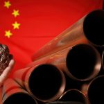 A person holds a piece of rare earth ore beside stacked metal tubes in front of China’s national flag, symbolizing China’s dominance in global mineral supply chains.